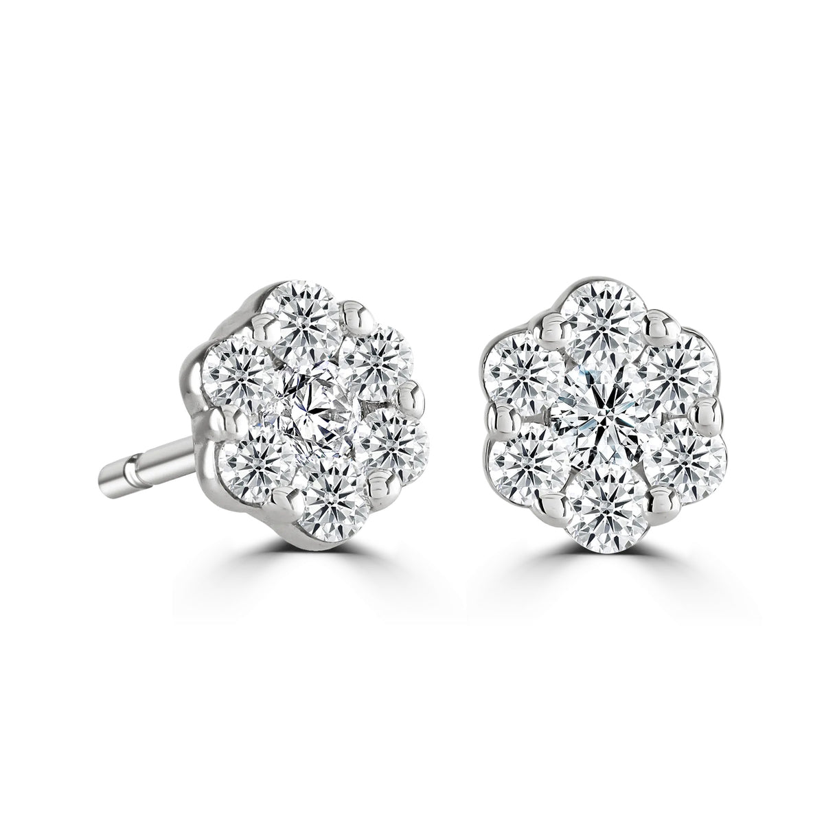 Pair of diamond stud earrings on a white background