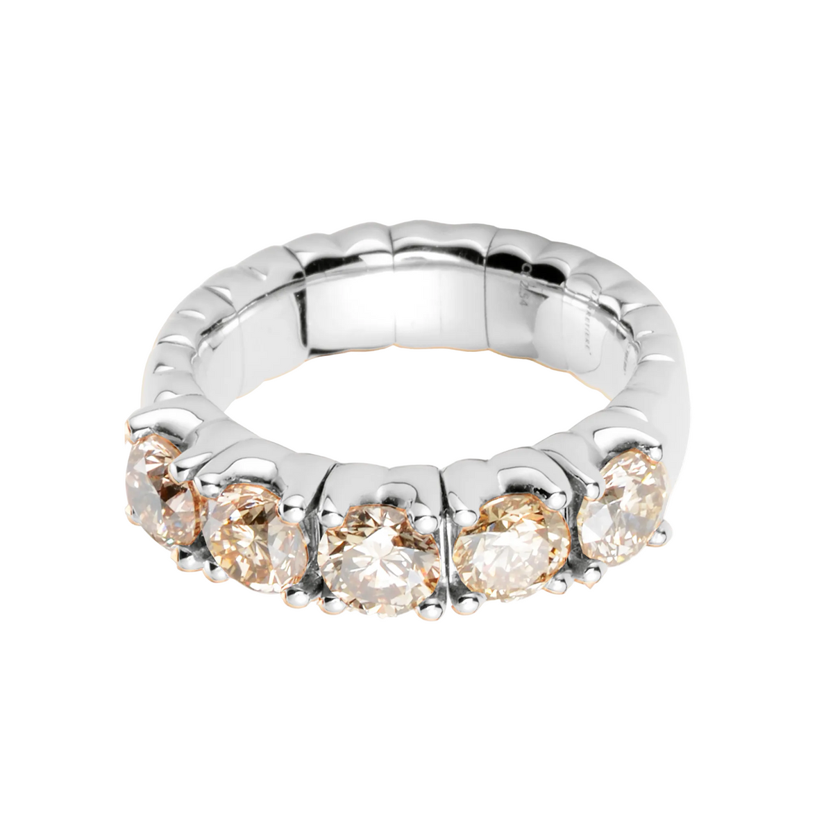 Silver ring with five diamonds on a white background
