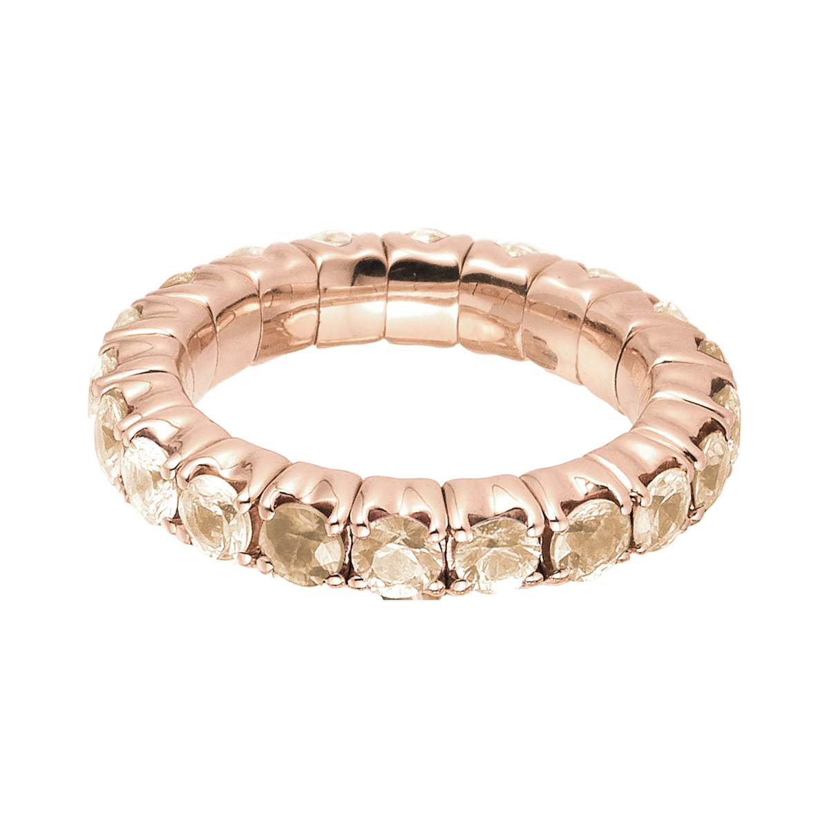 Rose gold ring with small stones on a white background