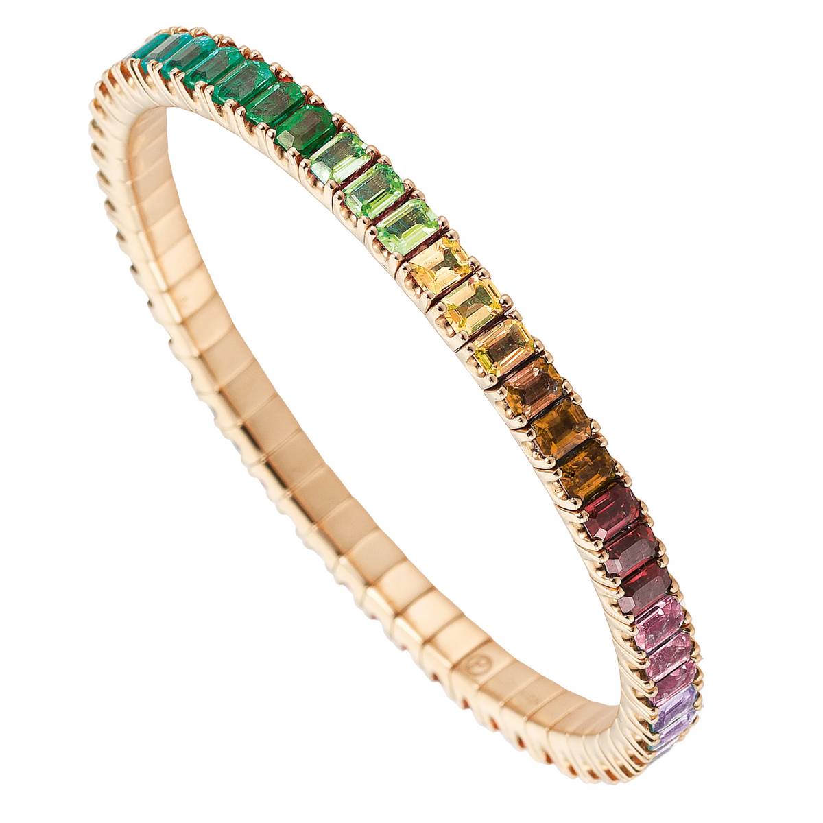 Gold bracelet with multicolored gemstones on a white background