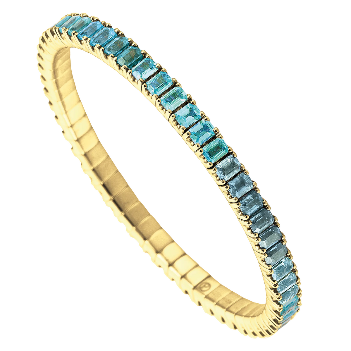 Gold tennis bracelet with blue gemstones on a white background