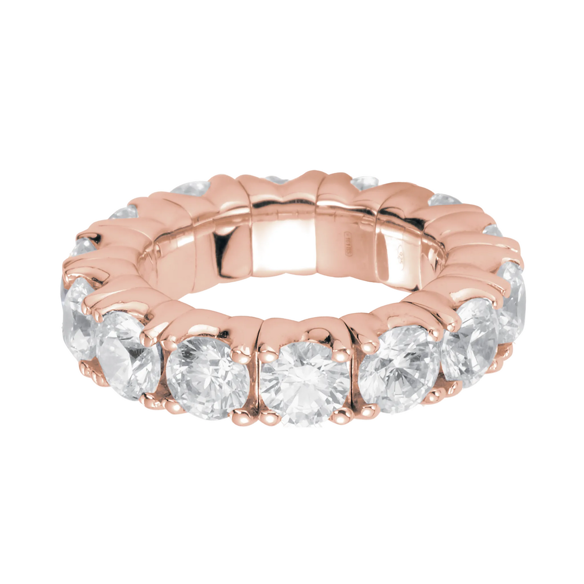Rose gold ring with clear gemstones on a white background