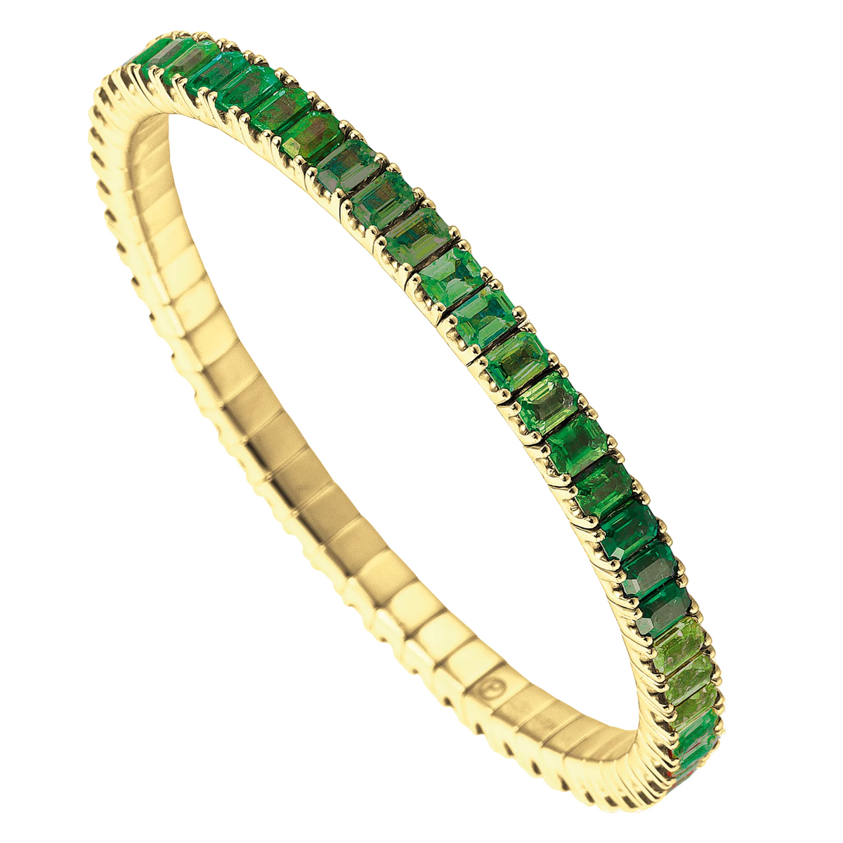Gold tennis bracelet with green gemstones on a white background