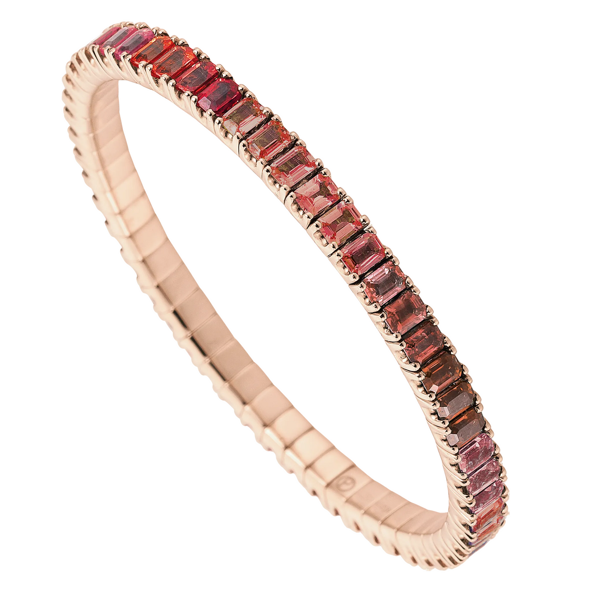 Rose gold bracelet with red gemstones on a white background