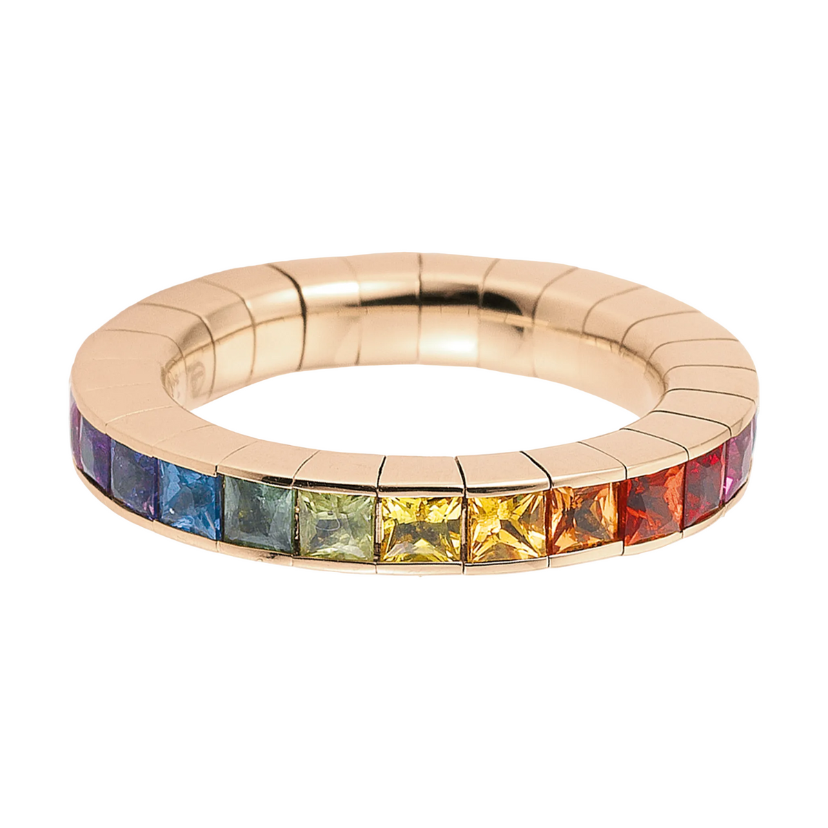 Gold ring with colorful gemstones on a white background
