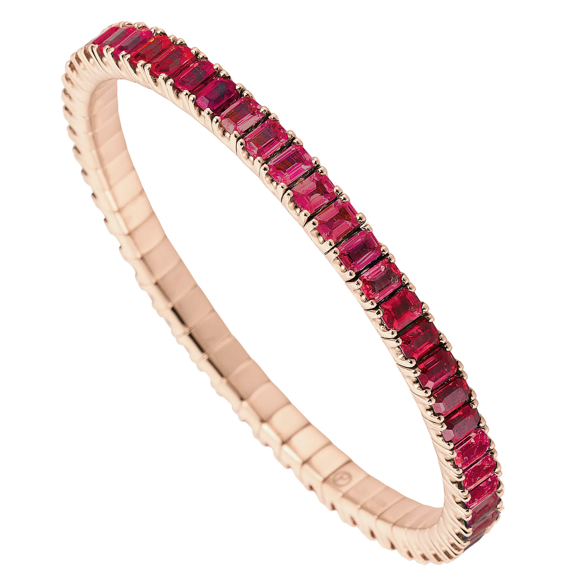 Rose gold bracelet with red gemstones on a white background