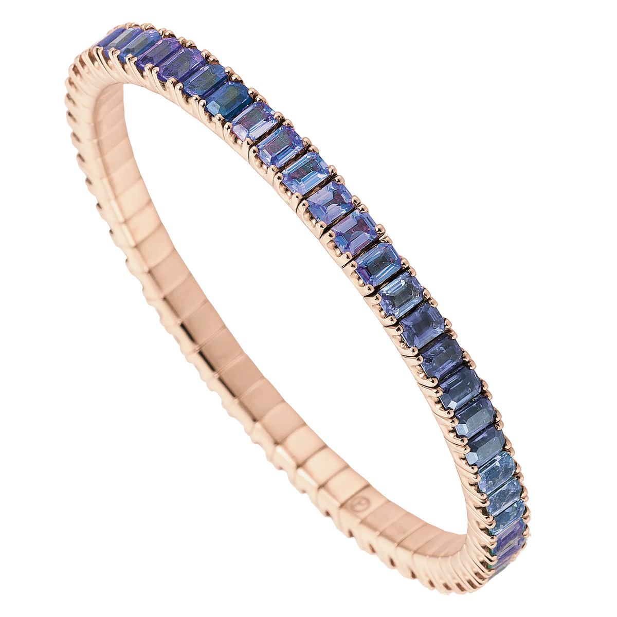 Rose gold tennis bracelet with blue gemstones on a white background