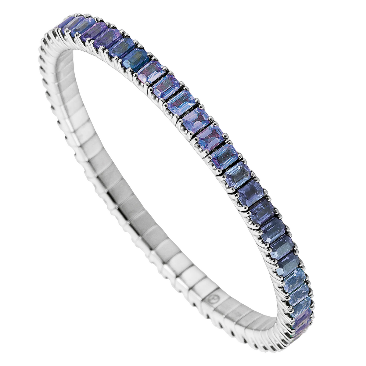 Silver bracelet with blue gemstones on a white background