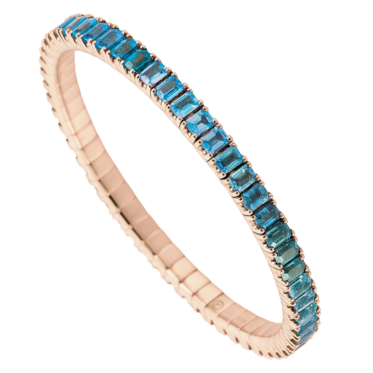 Rose gold tennis bracelet with blue gemstones on a white background