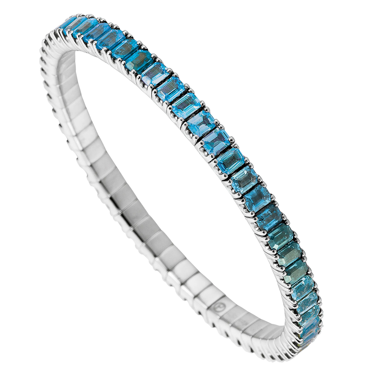 Silver bracelet with blue gemstones on a white background