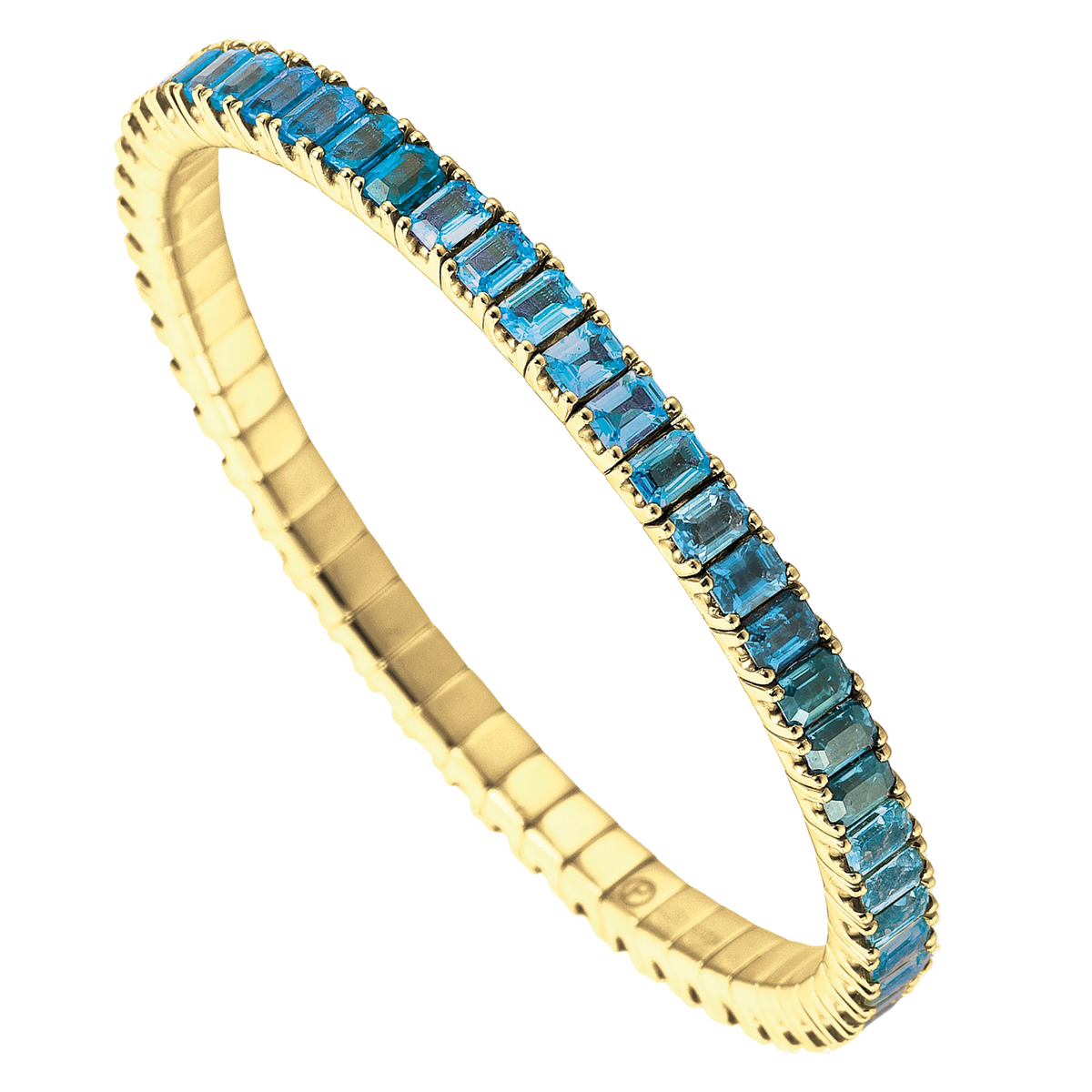 Gold tennis bracelet with blue gemstones on a white background