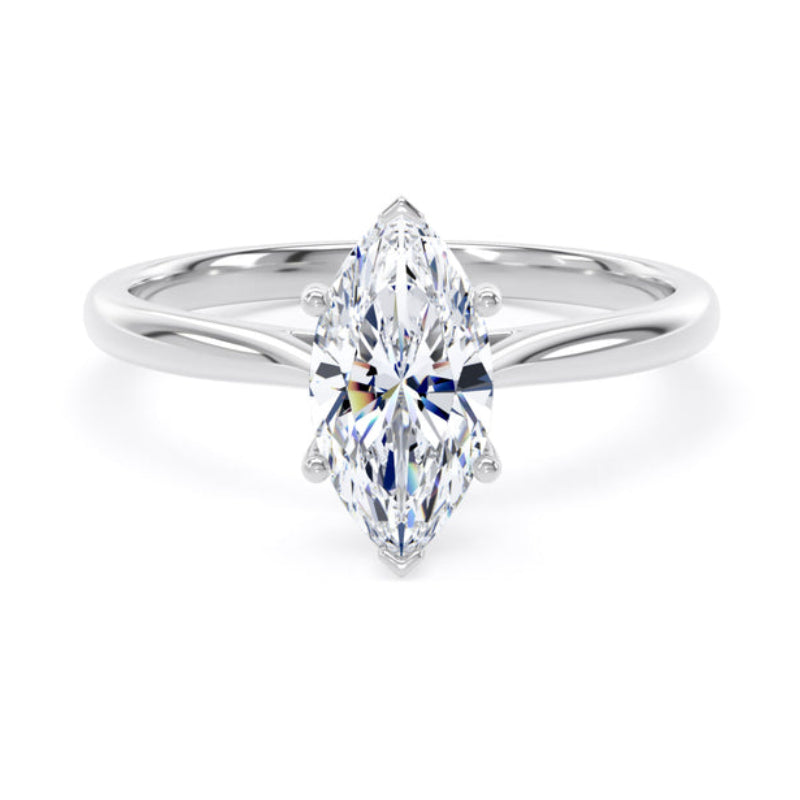A silver-tone ring featuring a marquise-cut clear gemstone in a four-prong setting, shown on a clean white background.