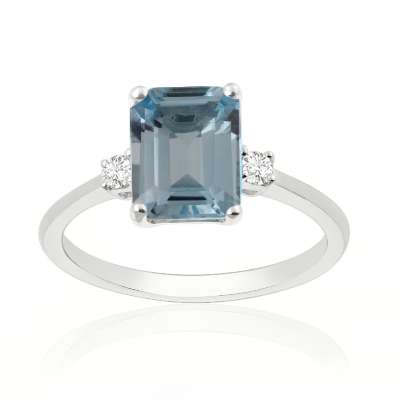 Elongated Radiant Cut Blue Topaz White Gold Trilogy Ring with Diamond Sidestones