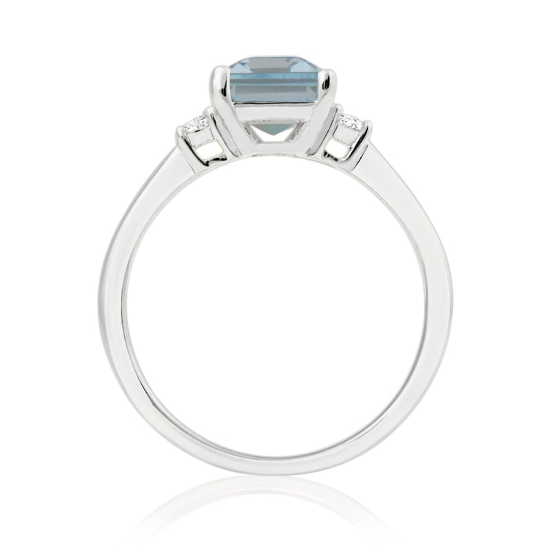 Elongated Radiant Cut Blue Topaz White Gold Trilogy Ring with Diamond Sidestones