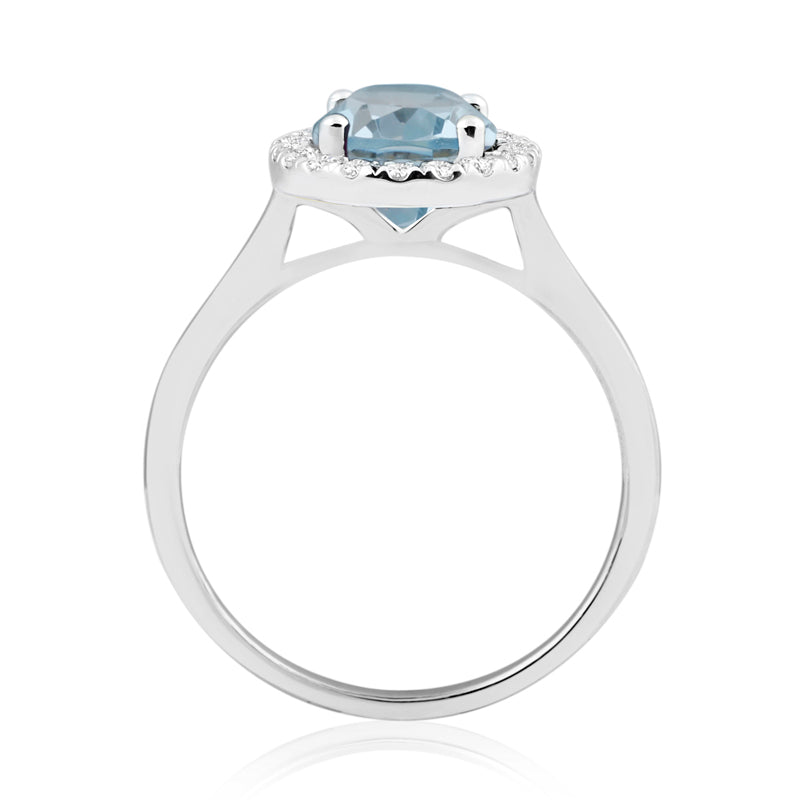 Oval Cut Blue Topaz White Gold Ring with Halo Set Diamonds