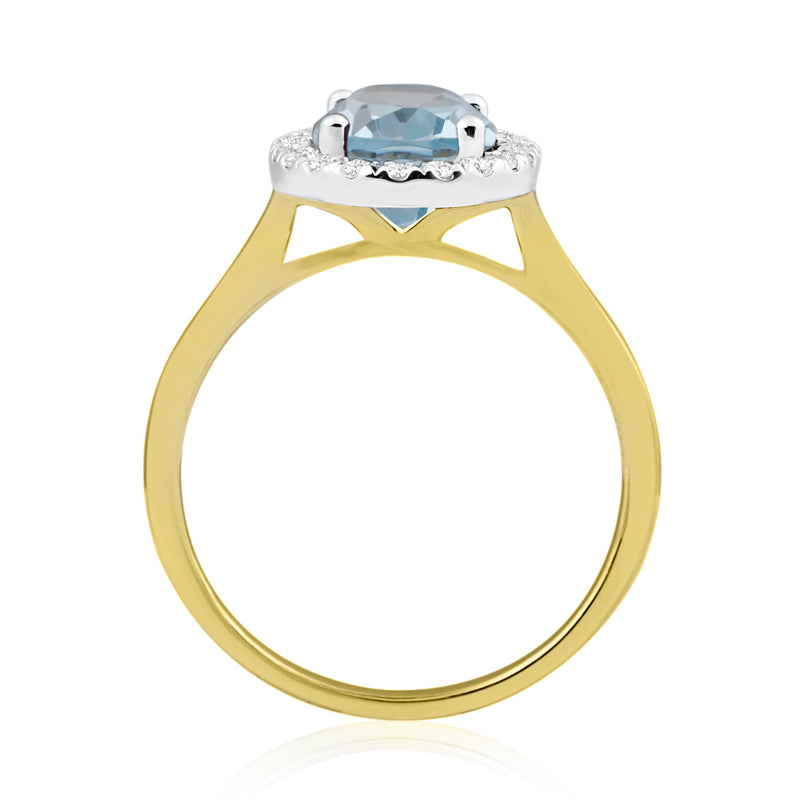 Oval Cut Blue Topaz Yellow Gold Ring with Halo Set Diamonds