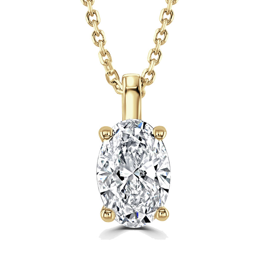 A yellow gold pendant necklace featuring an oval-cut clear gemstone in a four-prong setting, suspended from a matching gold chain against a solid white background.