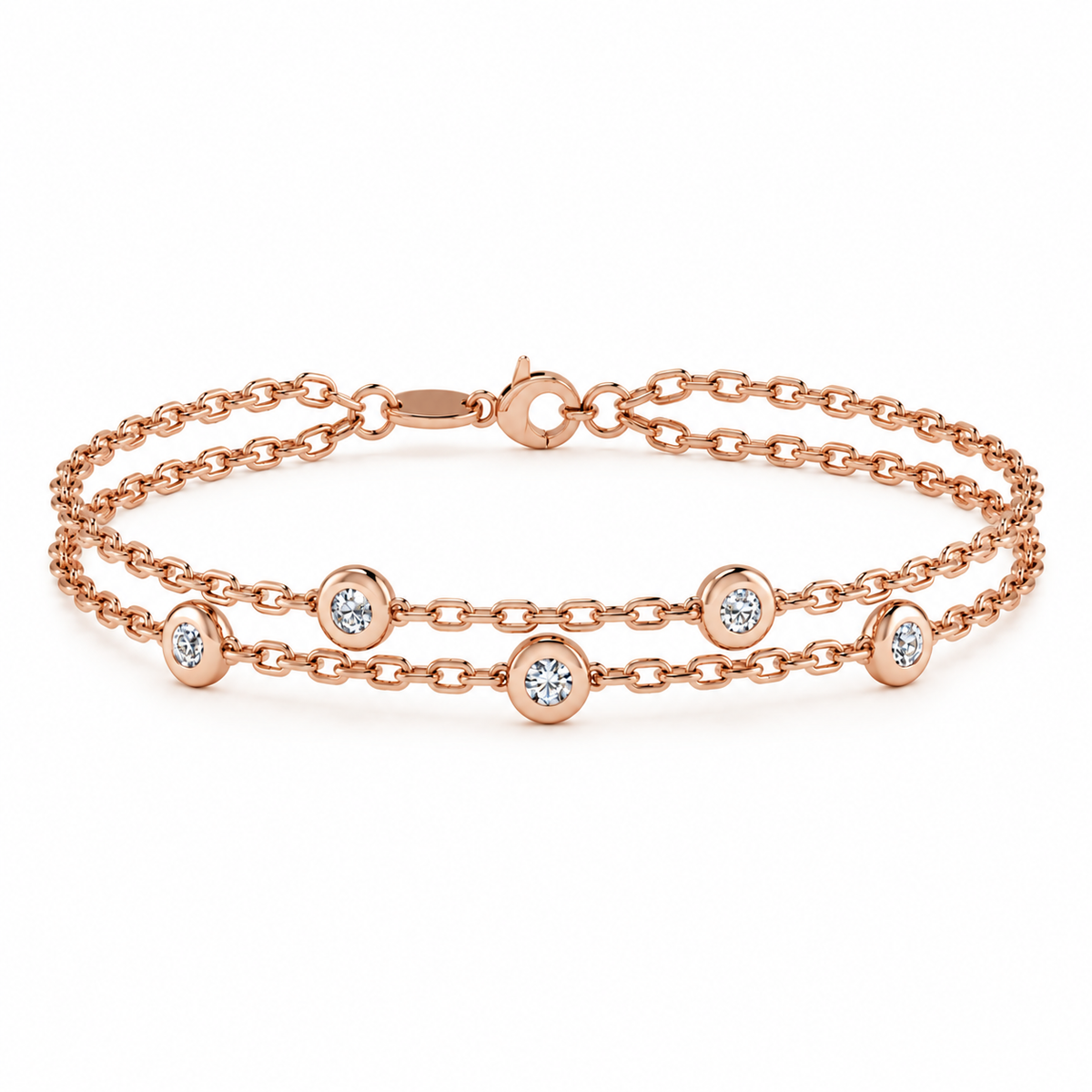 A double-strand rose gold chain bracelet with five bezel-set round clear gemstones, displayed on a clean white background.