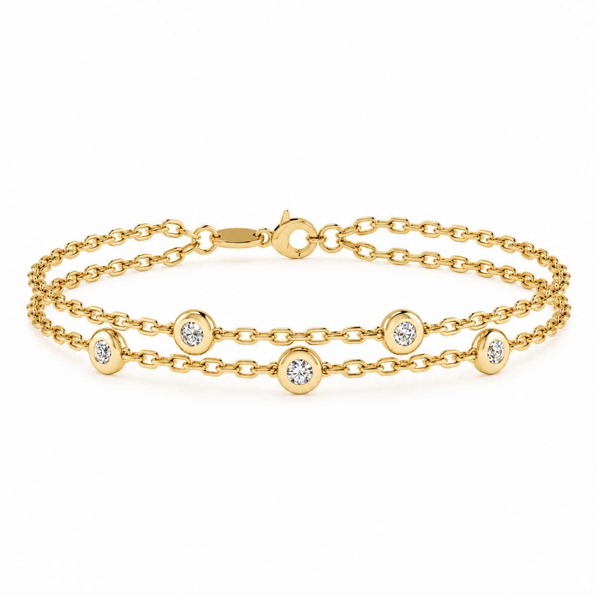 A double-strand yellow gold chain bracelet with five bezel-set round clear gemstones, displayed on a clean white background.