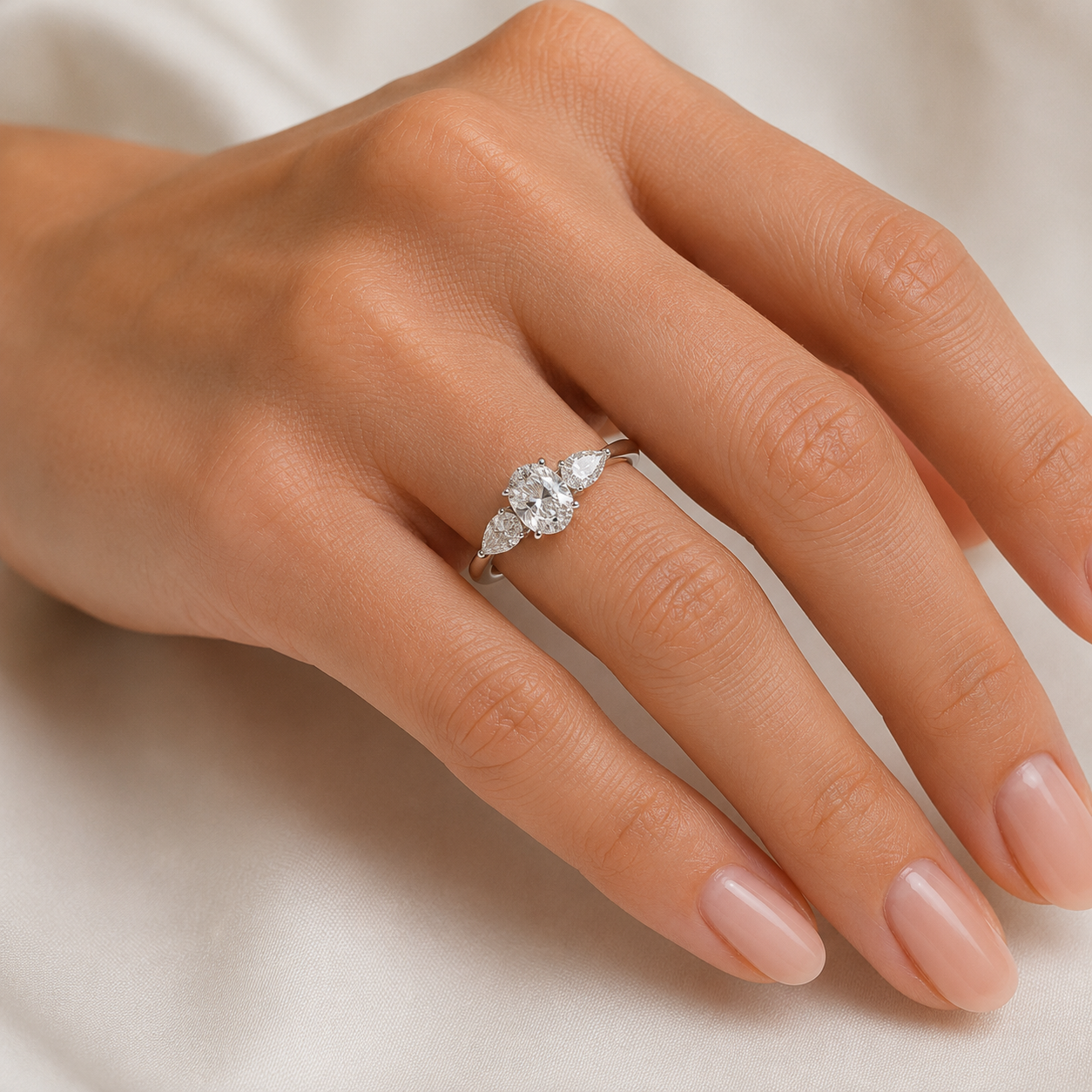 Oval & Pear Diamond Engagement Ring, Claw Set Trilogy | M3O05