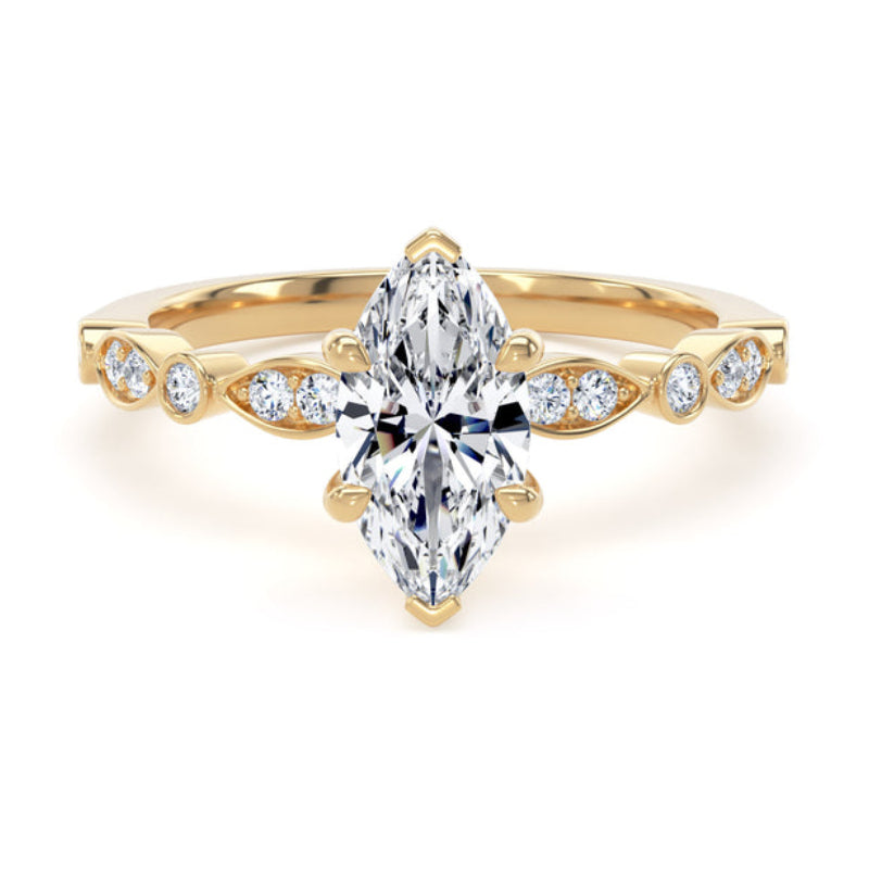 A yellow gold ring featuring a marquise-cut center diamond with smaller round diamonds set along the shoulders of the band, shown on a clean white background.