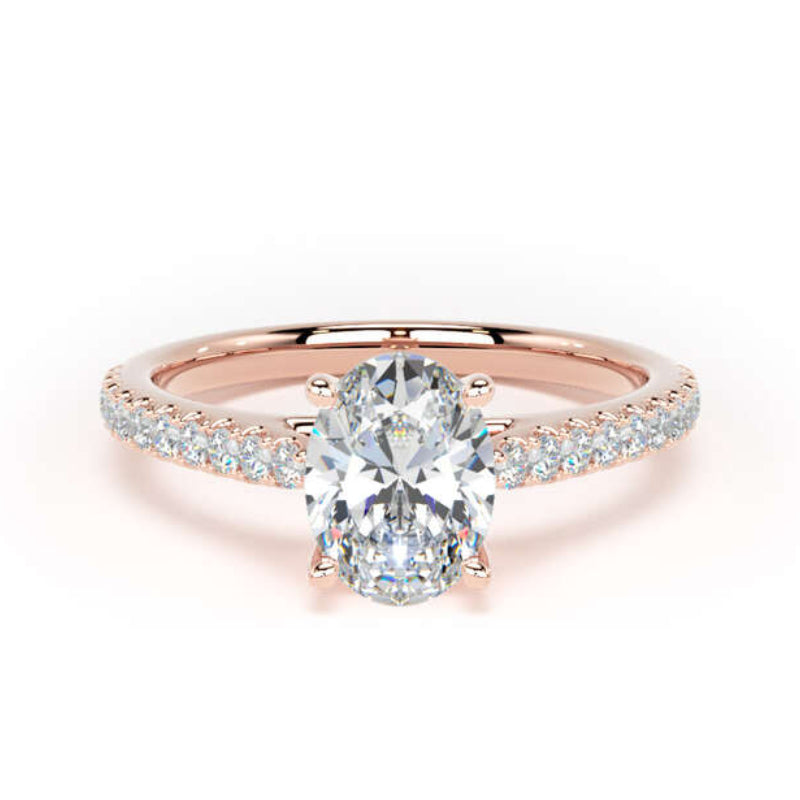 A rose gold engagement ring featuring a large oval-cut center stone and a pavé-set diamond band, shown on a clean white background.