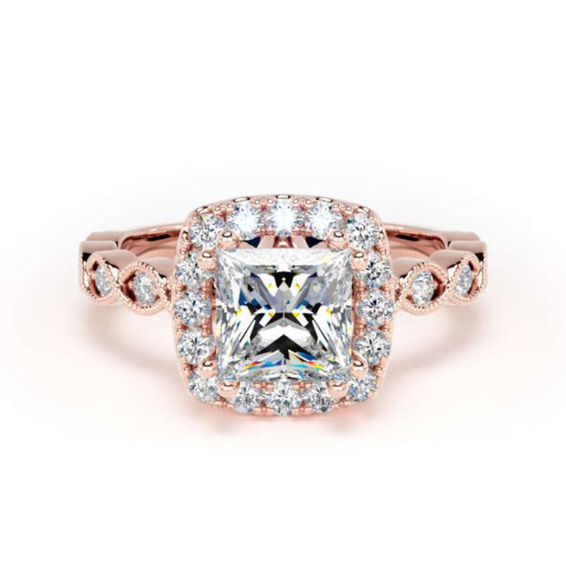 A square princess-cut diamond halo ring in rose gold, featuring a central diamond surrounded by a halo and small accent diamonds on the band, set against a plain white background.