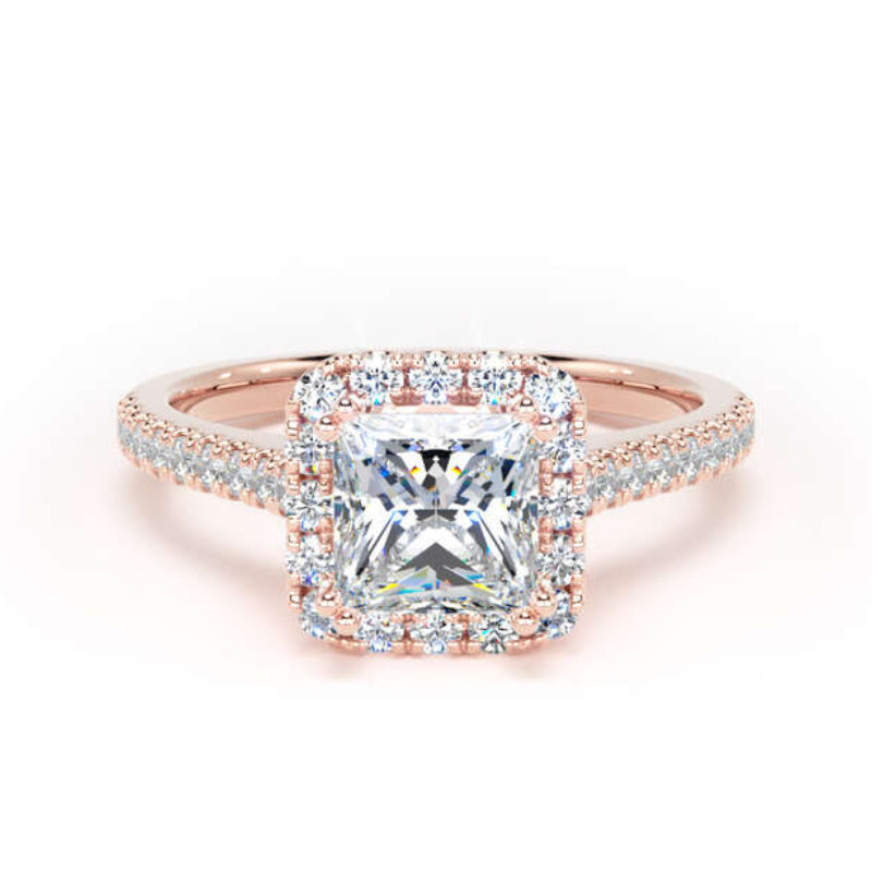 A rose gold halo ring featuring a large square radiant-cut center stone surrounded by a double halo of smaller clear stones, with a pavé-set band, shown on a clean white background.