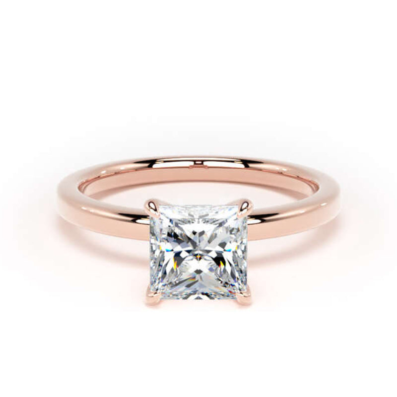 A rose gold solitaire ring featuring a brilliant princess-cut diamond, set against a clean white background.