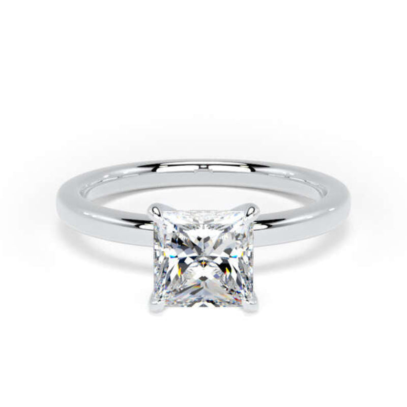 A classic solitaire engagement ring featuring a brilliant princess-cut diamond set in a polished white gold or platinum band, centered on a clean white background.