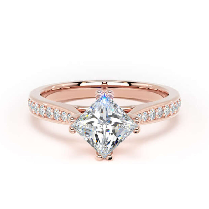 A rose gold engagement ring featuring a large princess-cut diamond center stone and a pavé band set with small round diamonds, shown on a clean white background.