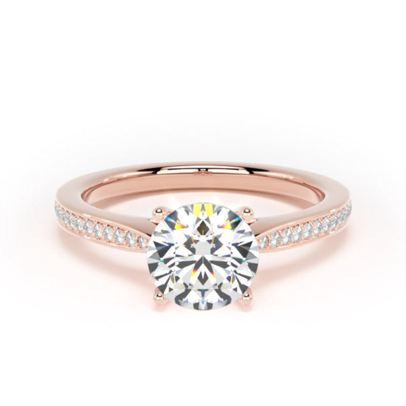 Rose gold ring with a large diamond and smaller diamonds on the band against a white background