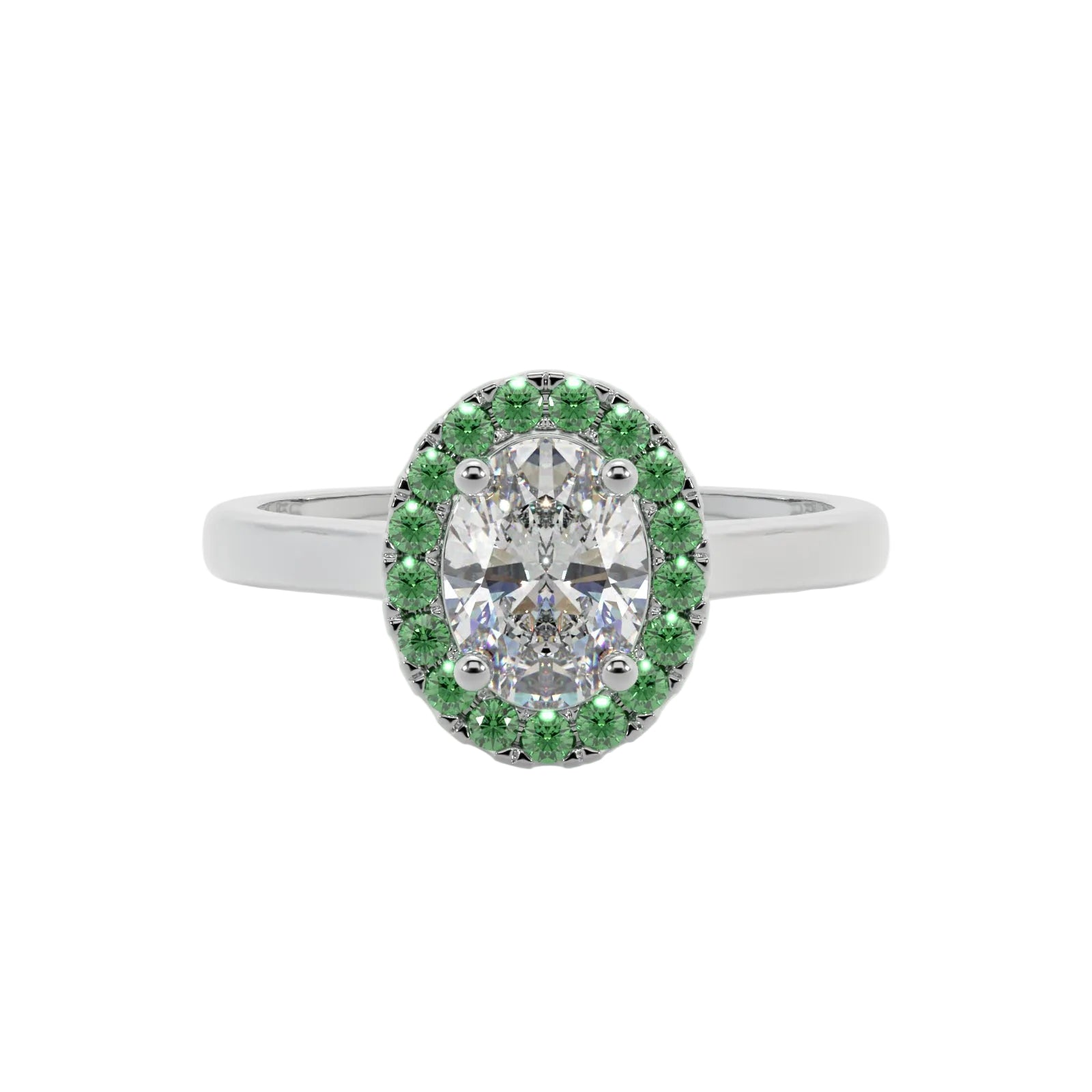 An oval halo ring featuring a central round brilliant-cut diamond surrounded by a double halo of small round green gemstones in a silver-toned setting, shown on a light gray background.