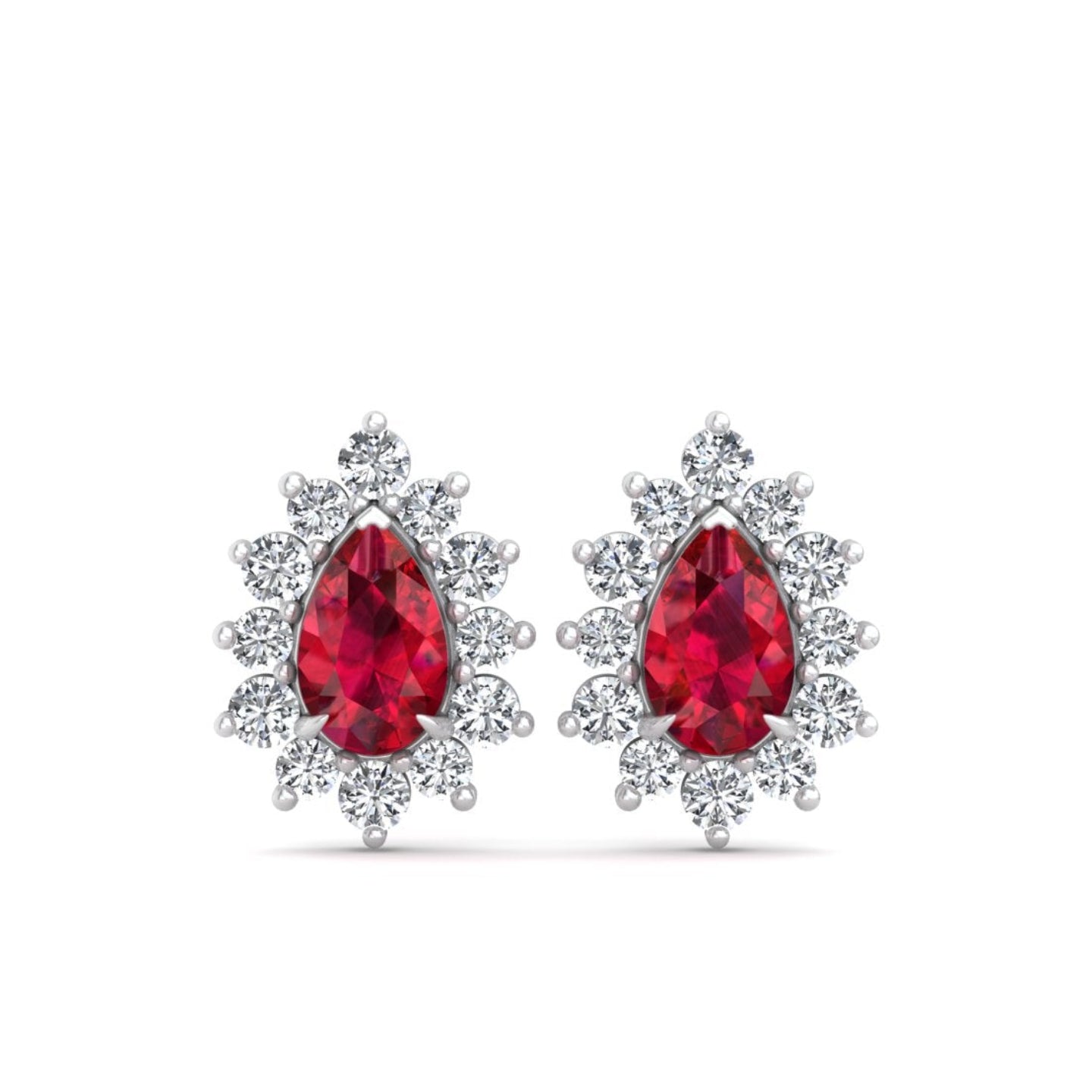 A pair of silver stud earrings featuring a central teardrop-shaped red gemstone surrounded by a halo of small clear stones, shown on a plain white background.