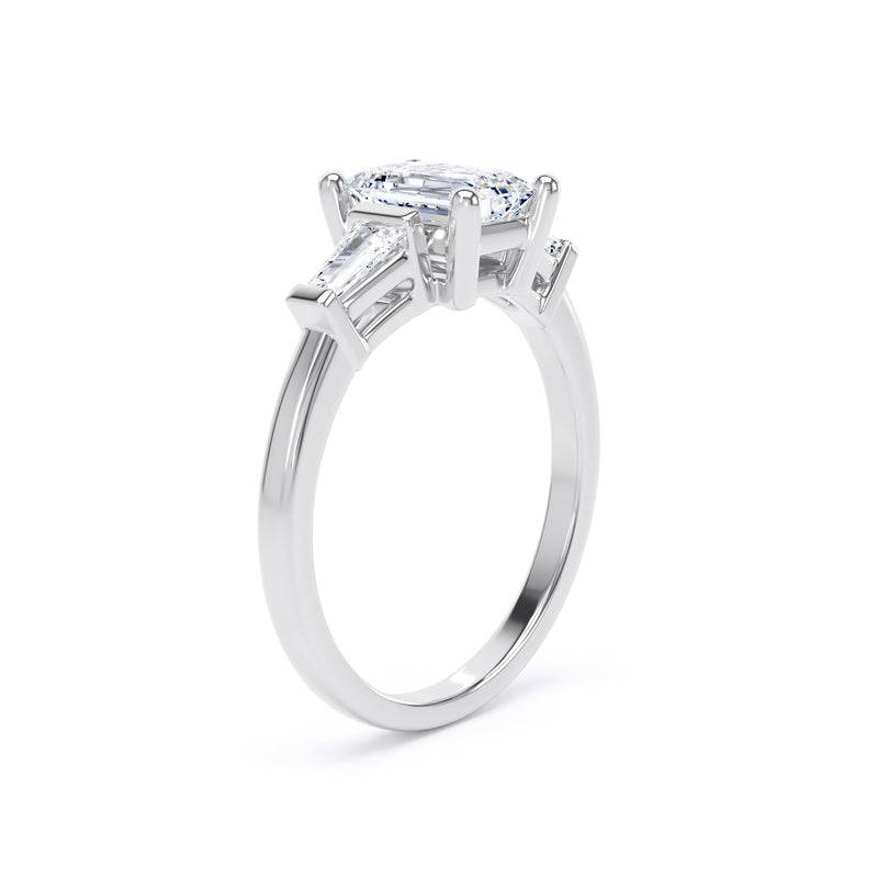 Emerald & Tapered Baguette Platinum Trilogy Ring | M3E01 LGE