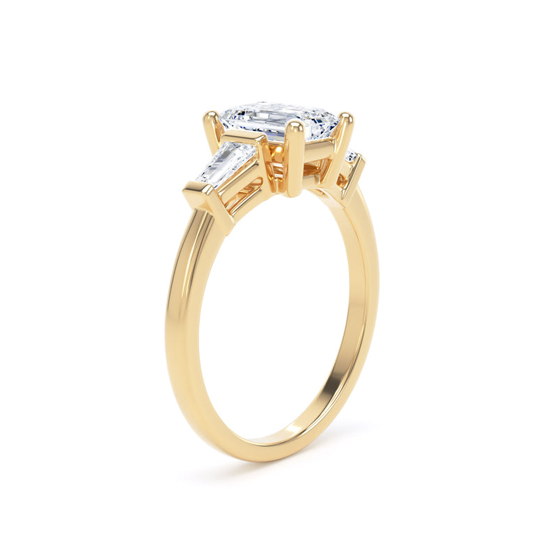 Emerald & Tapered Baguette Yellow Gold Trilogy Ring | M3E01 LGE