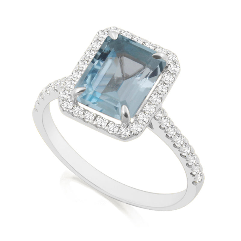 Emerald Cut, Blue Topaz Platinum Ring with Shoulder & Halo Set Diamonds