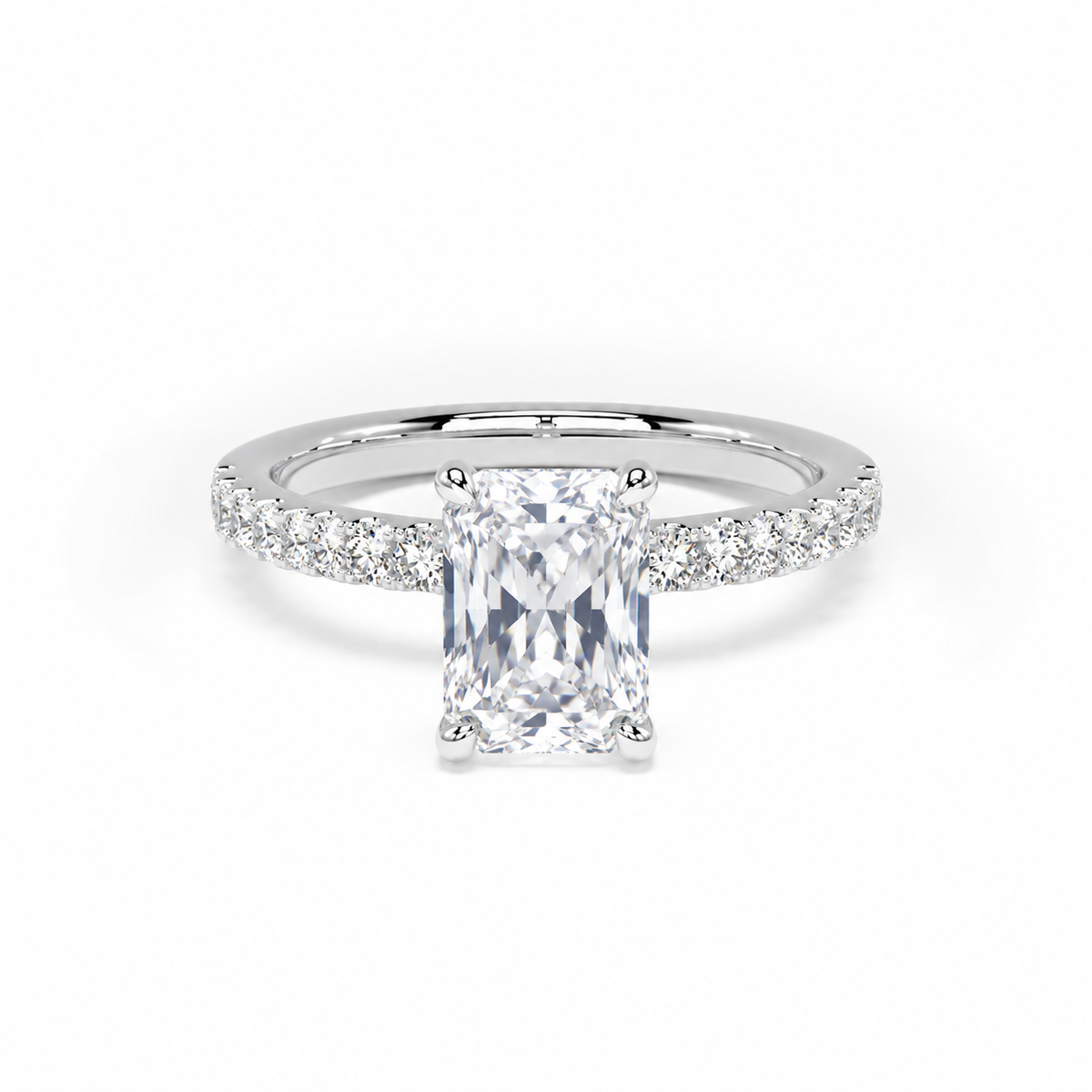 An radiant-cut diamond engagement ring with a pavé-set diamond band in a silver-colored metal, shown on a clean white background.