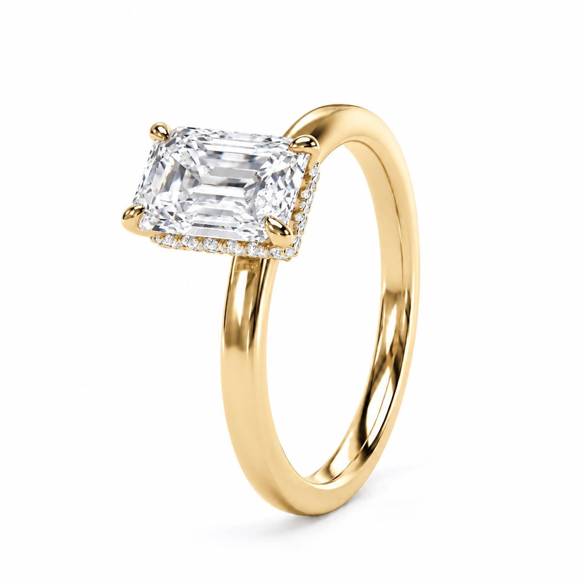 A yellow gold ring featuring a large radiant-cut diamond center stone and a halo of small diamonds, set on a polished gold band against a clean white background.