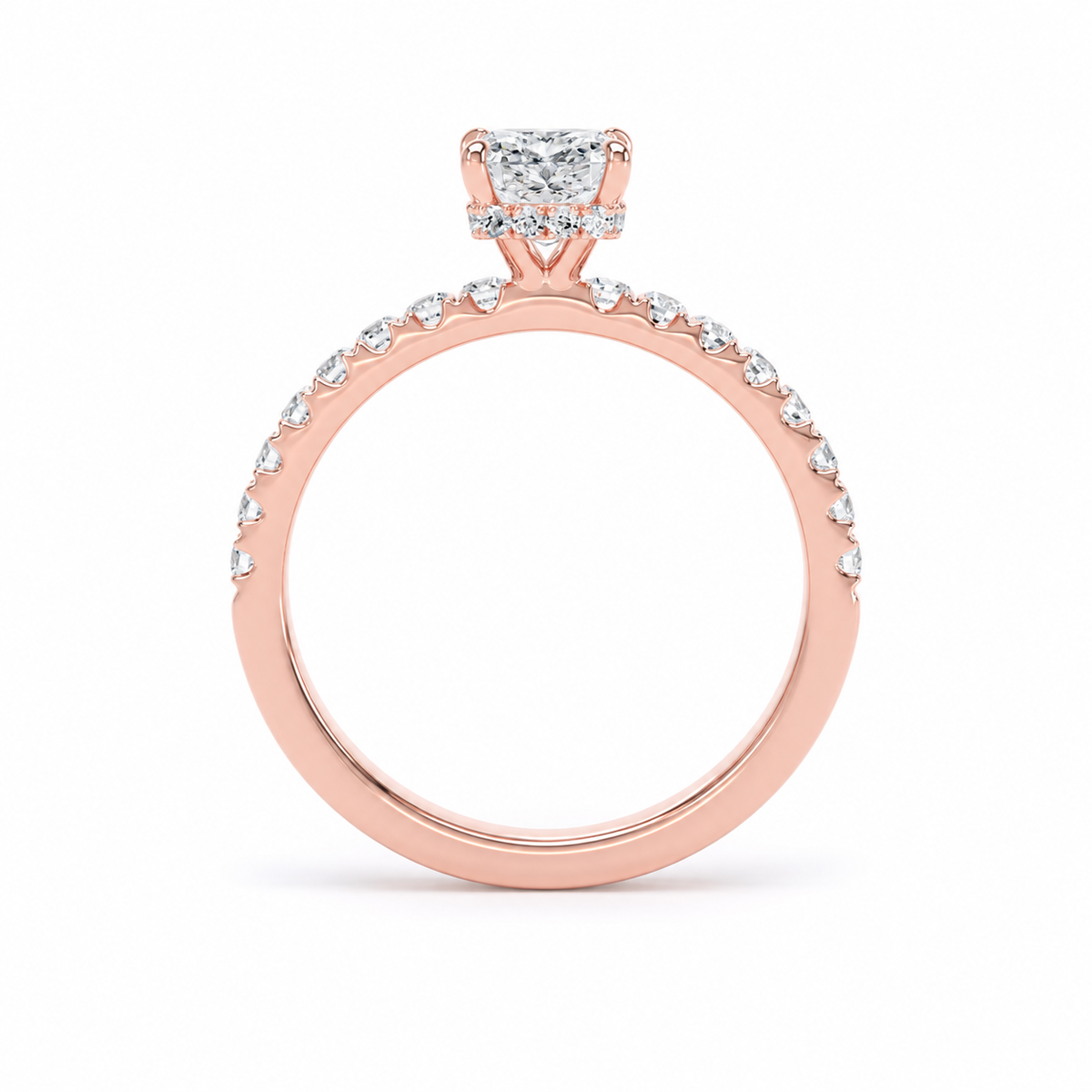 A rose gold engagement ring featuring a radiant brilliant-cut center stone and a pavé band with small round stones, shown on a clean white background.