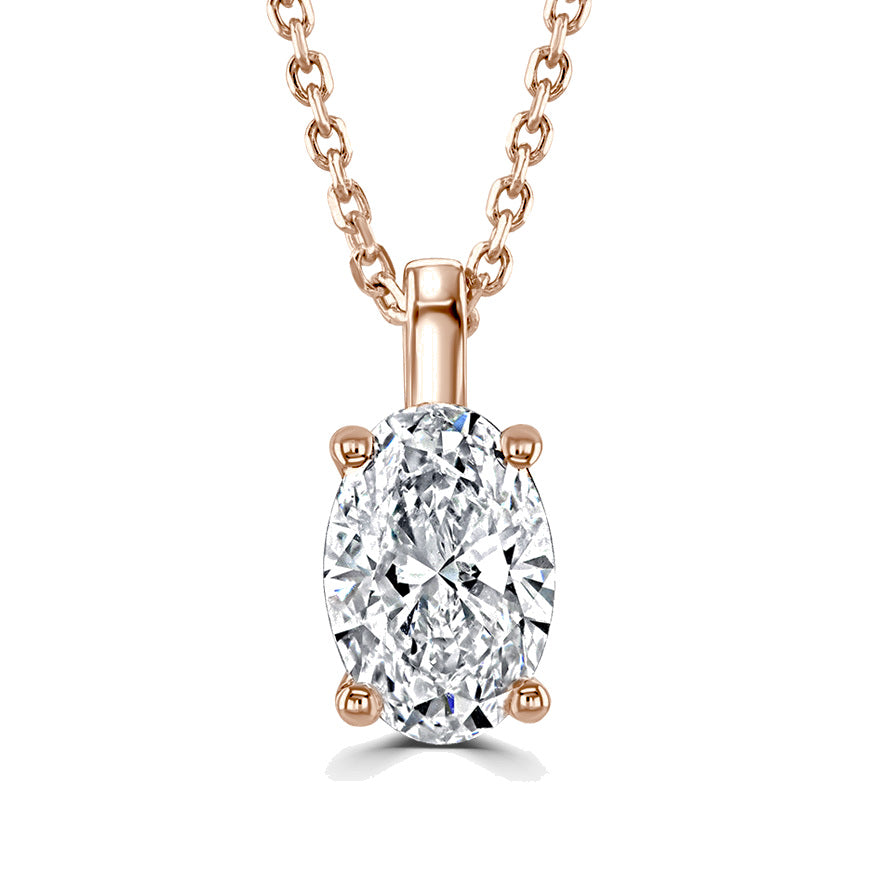 An oval-cut diamond pendant necklace in a rose gold setting on a matching rose gold chain, shown against a solid white background.
