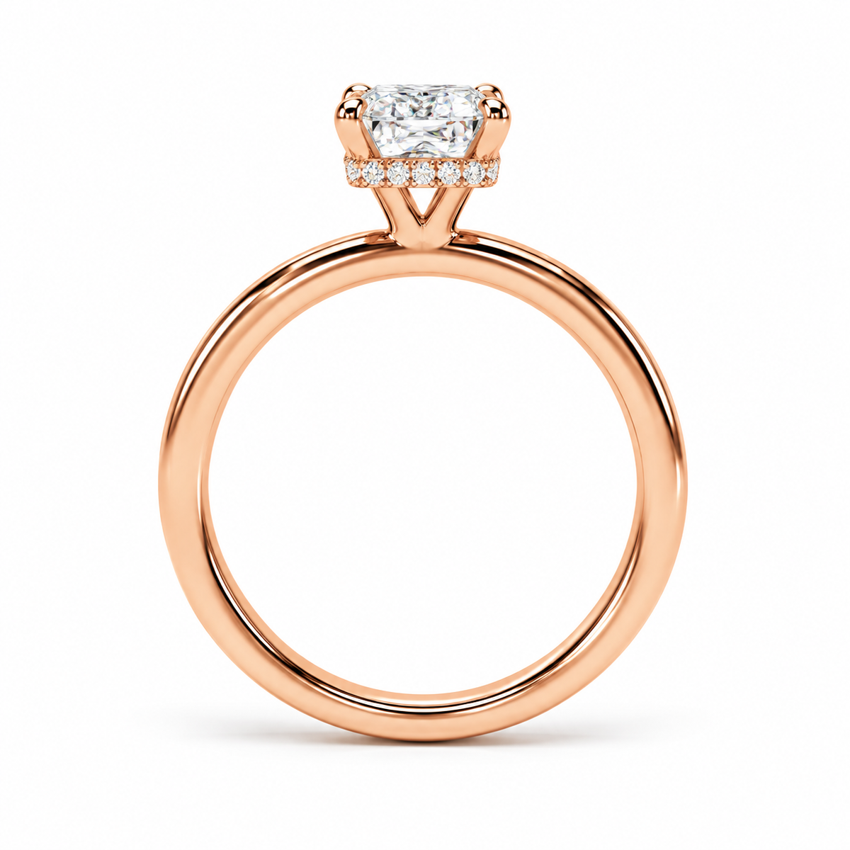 Rose gold ring with a radiant-cut diamond center stone and a row of small diamonds in the halo, shown on a clean white background.