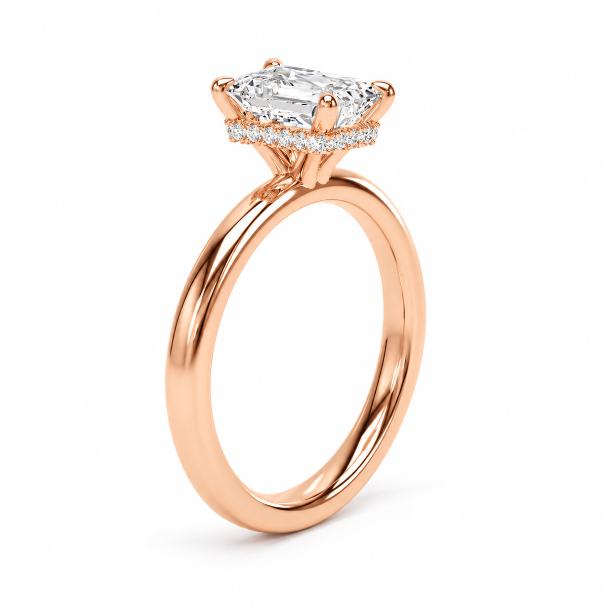 A rose gold engagement ring featuring a radiant-cut diamond center stone and a halo of small diamonds, shown on a clean white background.
