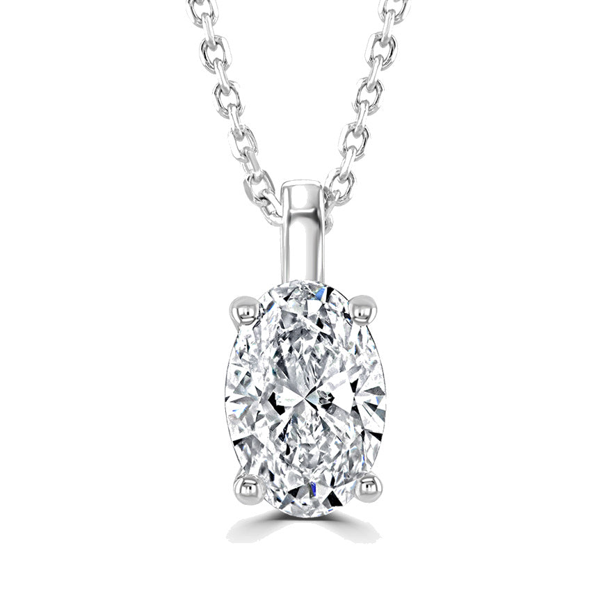 An oval-cut diamond pendant necklace in a silver four-prong setting on a matching silver chain, shown against a plain white background.