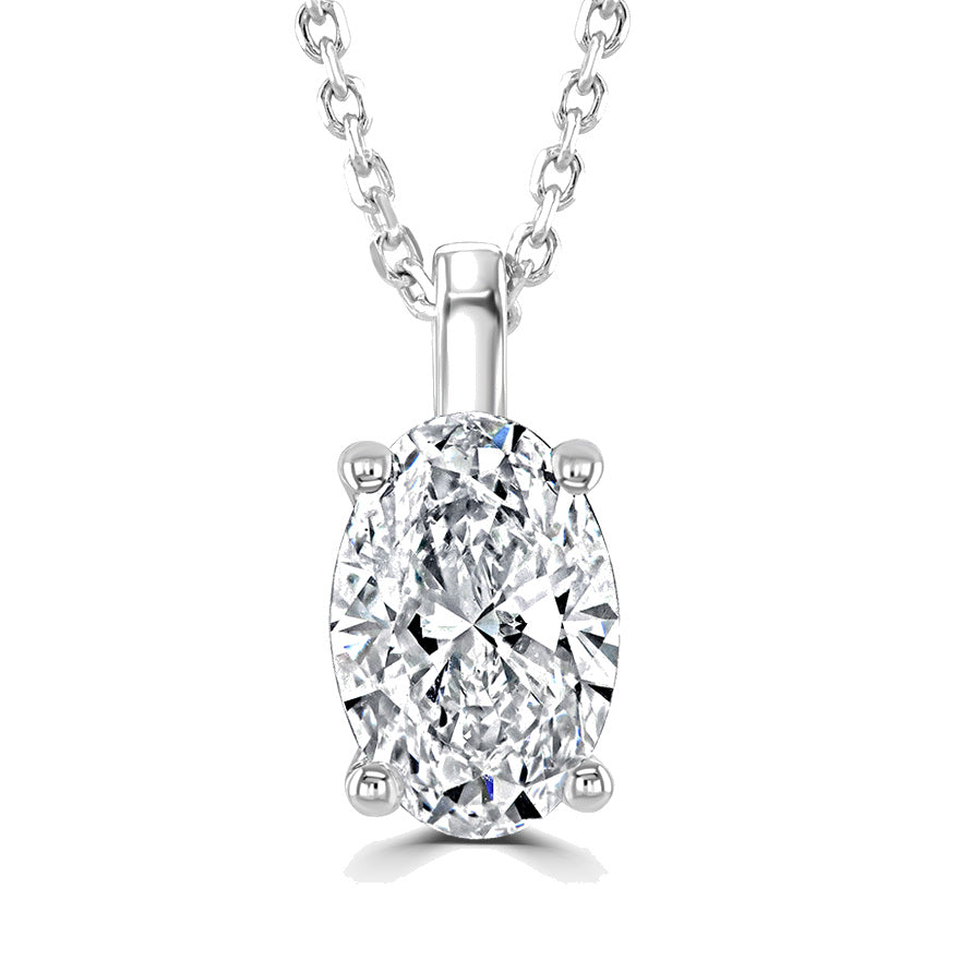 An oval-cut diamond pendant necklace in a four-prong silver setting on a matching silver chain, shown against a plain white background.