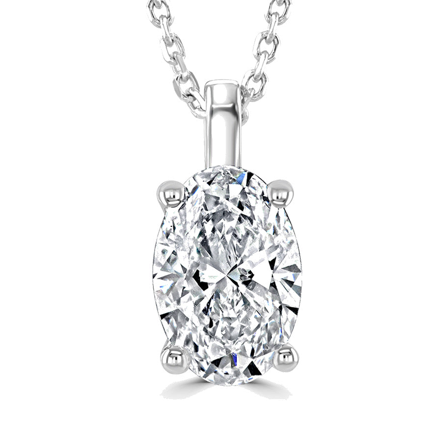 An oval-cut diamond pendant necklace in a four-prong silver setting on a matching silver chain, shown against a solid white background.