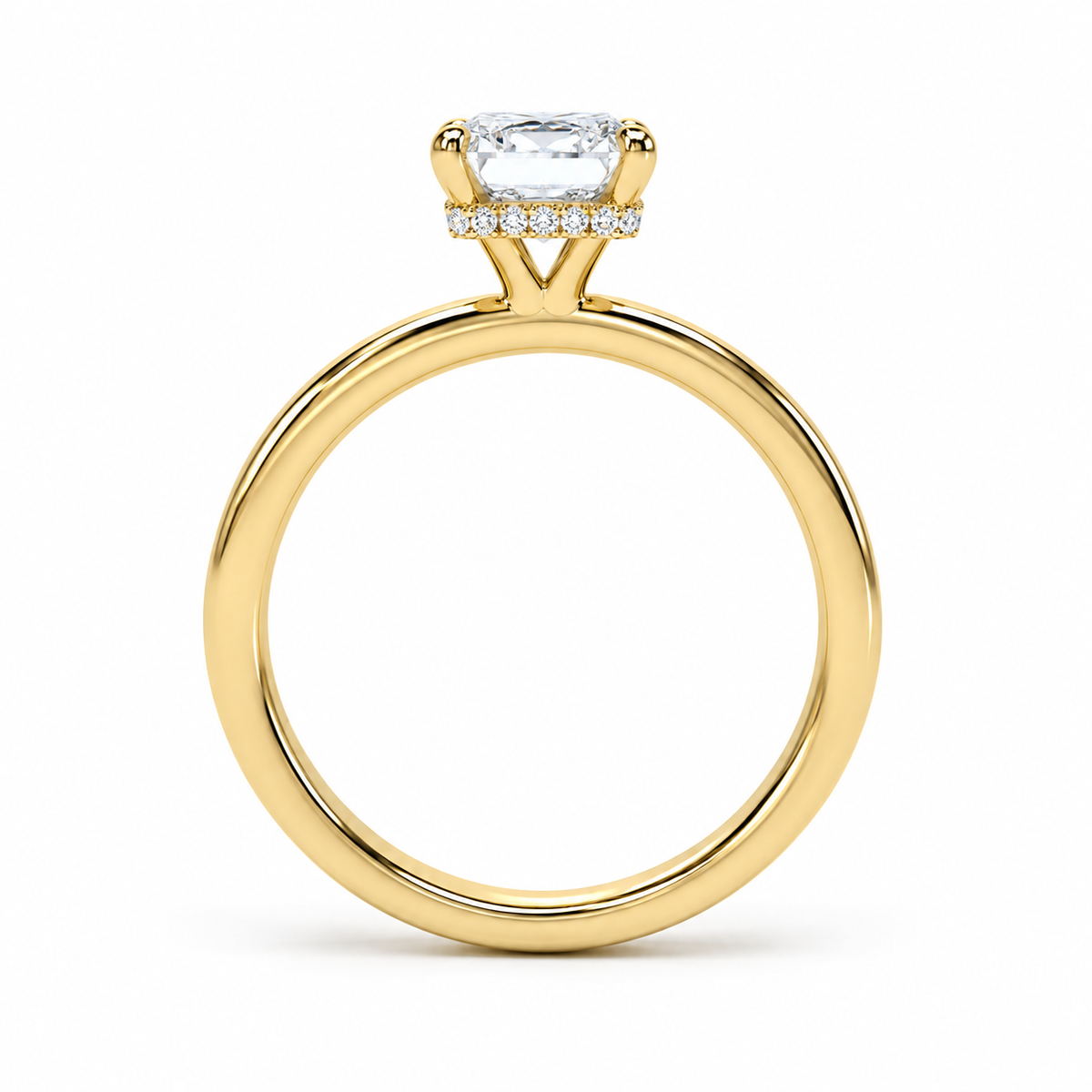 A yellow gold ring featuring a large radiant-cut clear gemstone in a prong setting, accented by a row of small round diamonds along the band, shown on a plain white background.