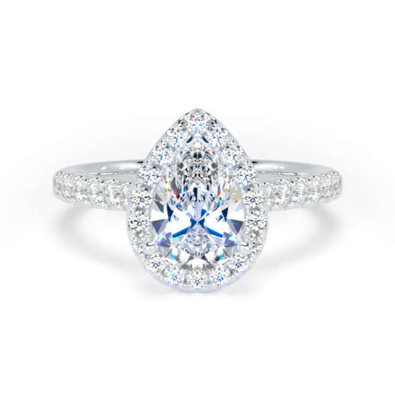 A pear-cut halo engagement ring featuring a central clear gemstone surrounded by a halo and a pavé-set band, shown on a plain white background.