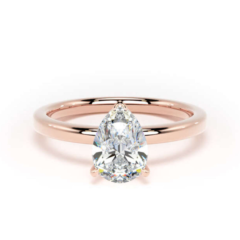 A pear-cut diamond engagement ring in a rose gold band, centered on a clean white background.