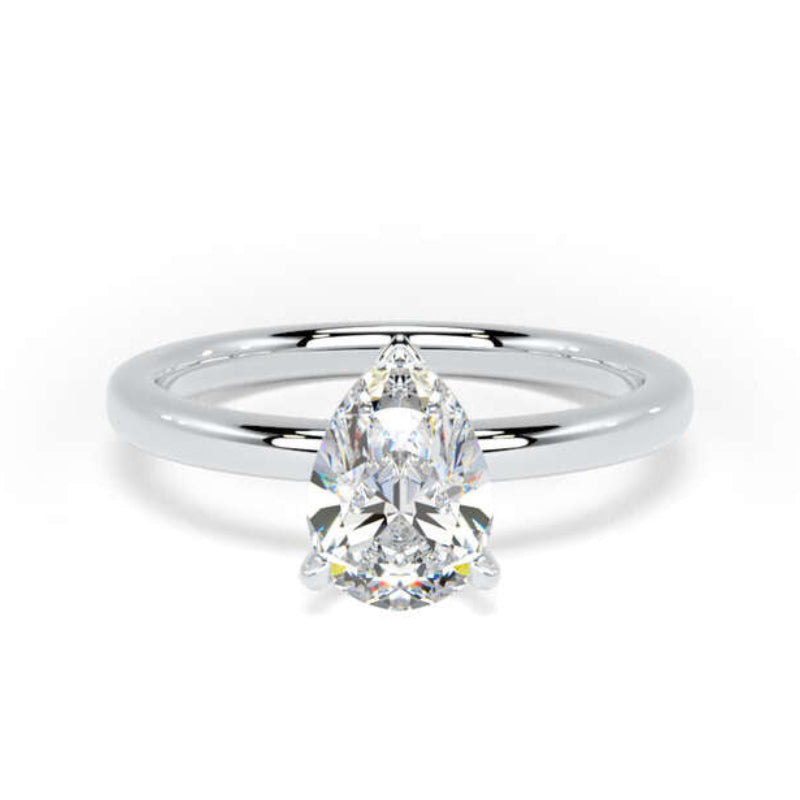 A pear-cut diamond engagement ring with a polished silver-colored band, shown on a clean white background.